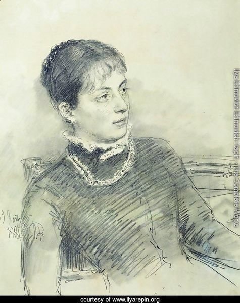 Portrait of a young wife, sitting on the couch